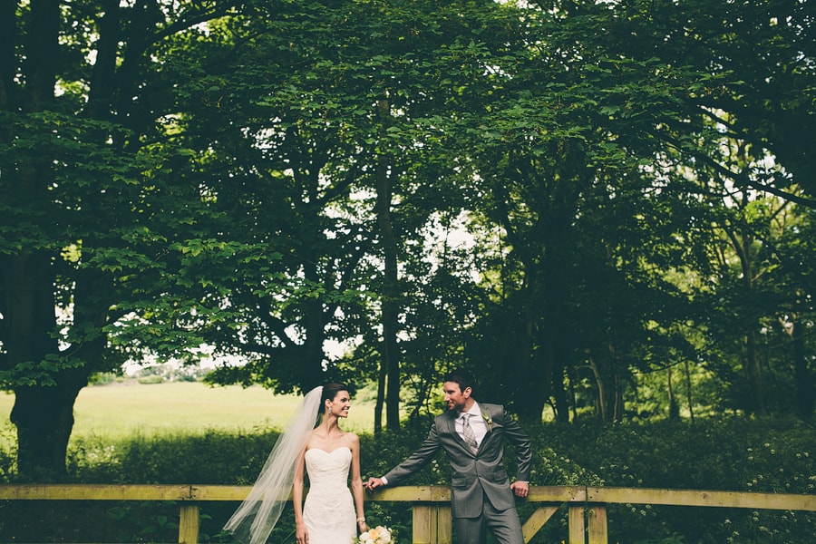 bride and groom in the woods in ireland