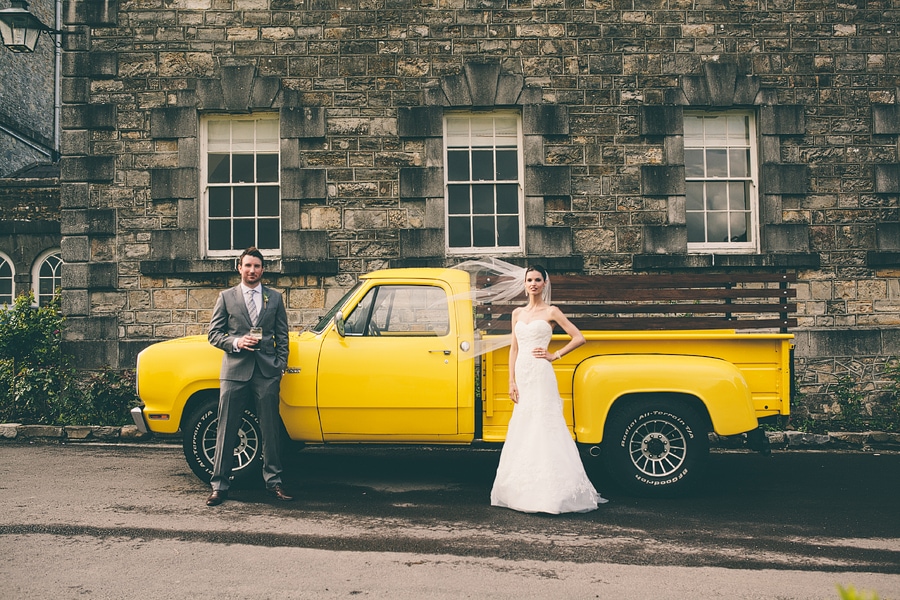 wedding portrait in front of american truck