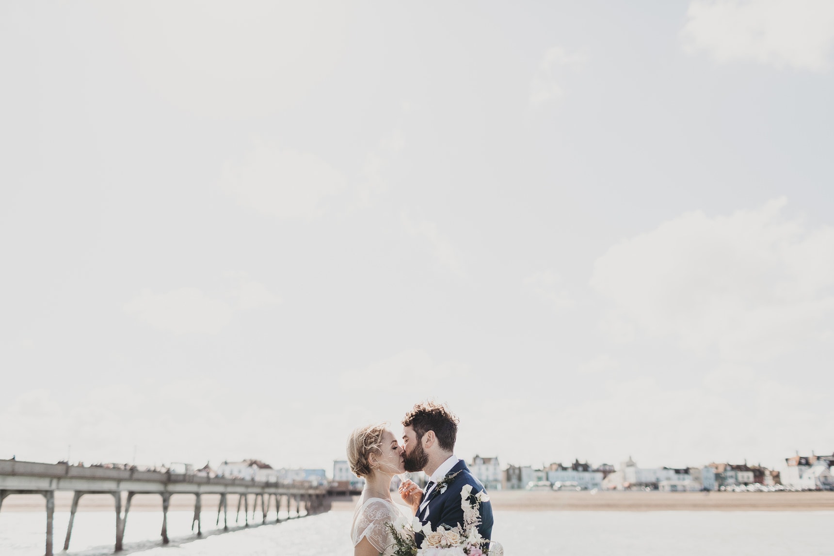 wedding portrait next to the ocean