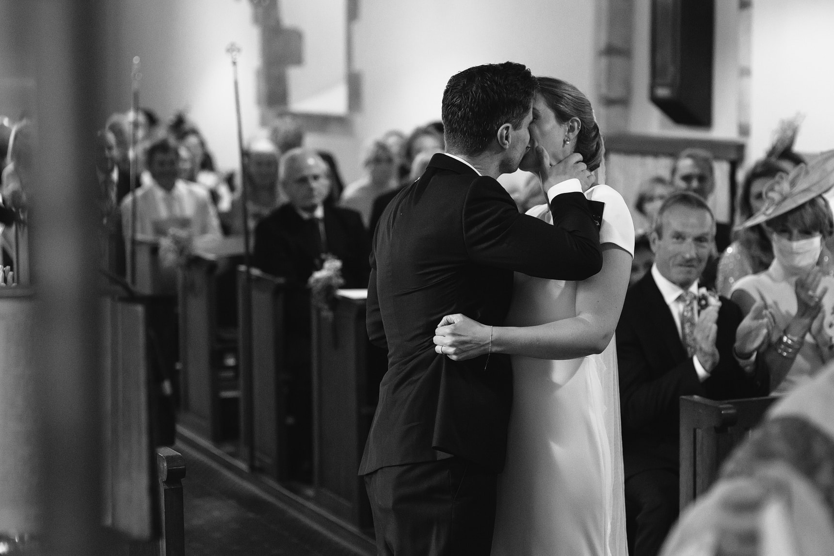 bride and grooms first kiss once married